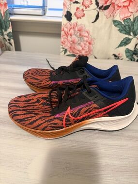 Nike Running Shoes - Orange Tiger Print with Pink Swoosh and Blue Lining